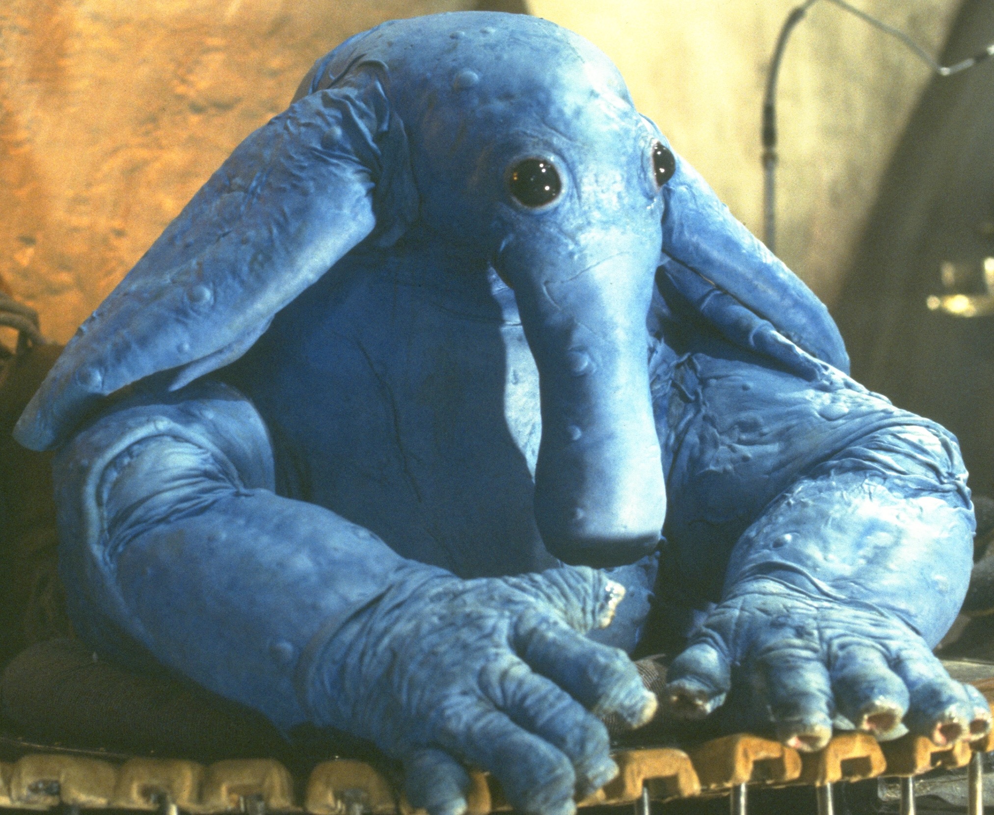 What is the background of Max Rebo?